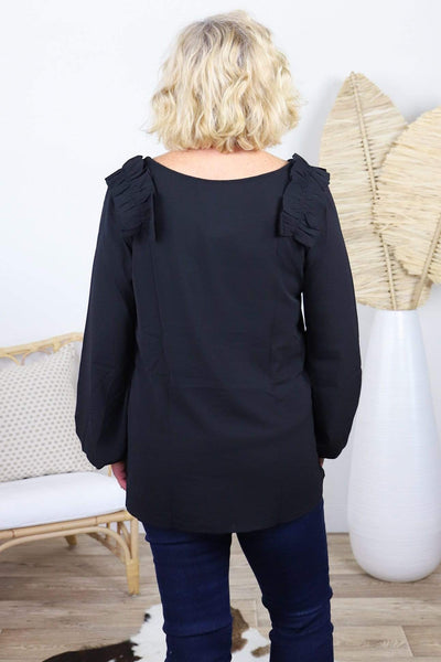 black long sleeve ruffle top