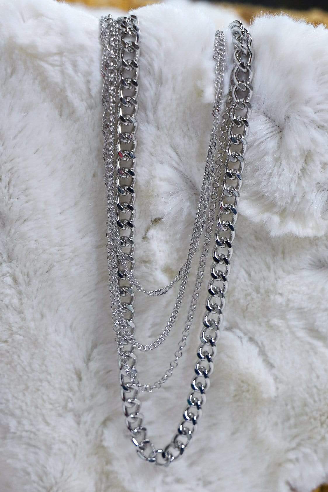 four silver chain necklace, very trendy chains