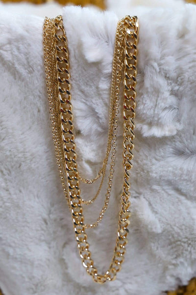four gold chain necklace, very trendy chains