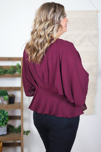 flowing wine top with large sleeves 
