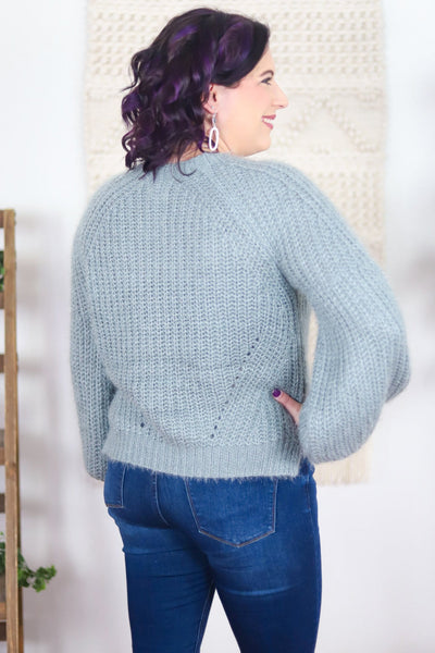 blue knit shimmer sweater back