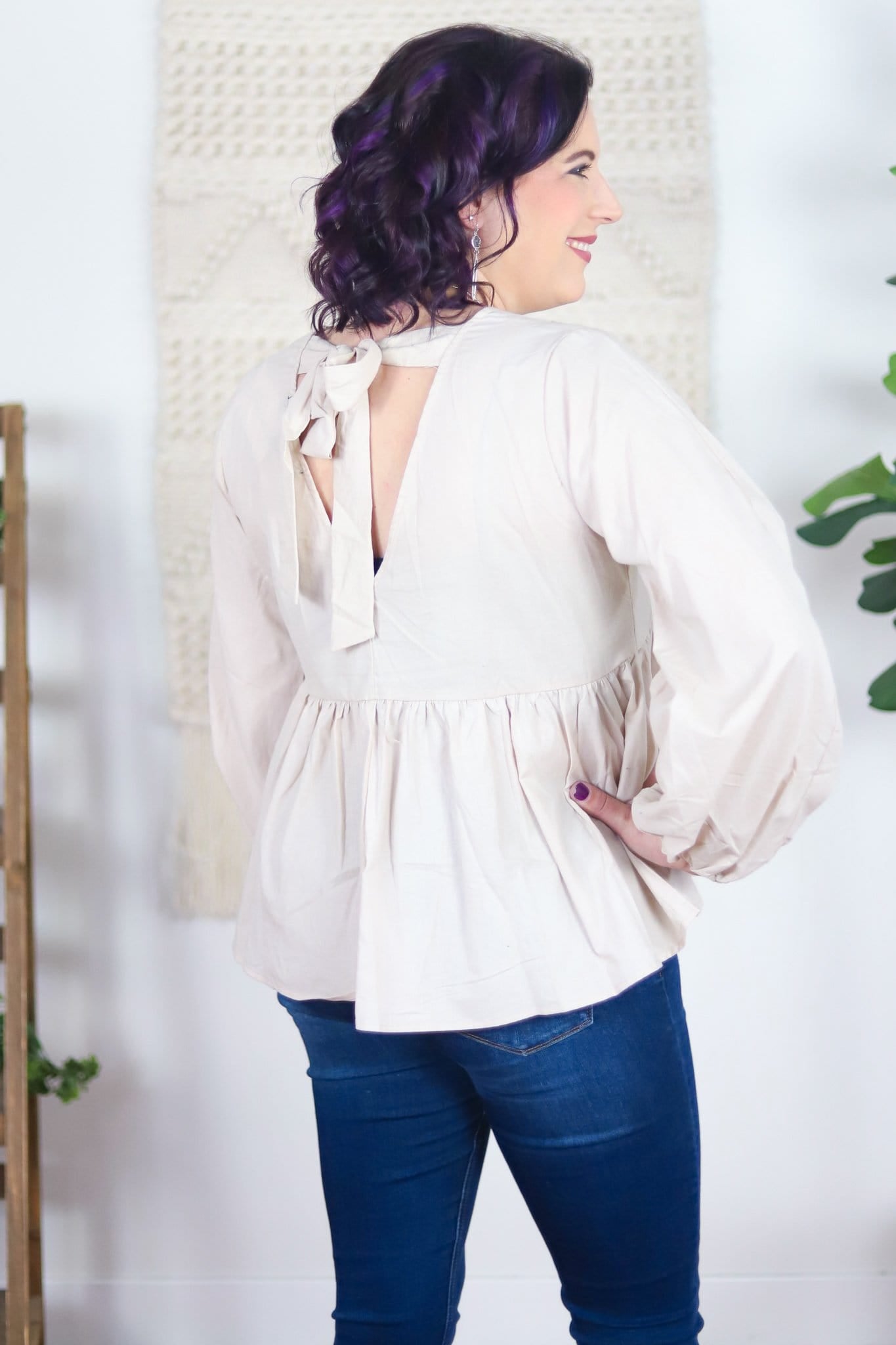 tied back light colored babydoll top