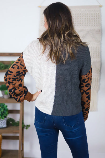 black white and leopard print sweater back