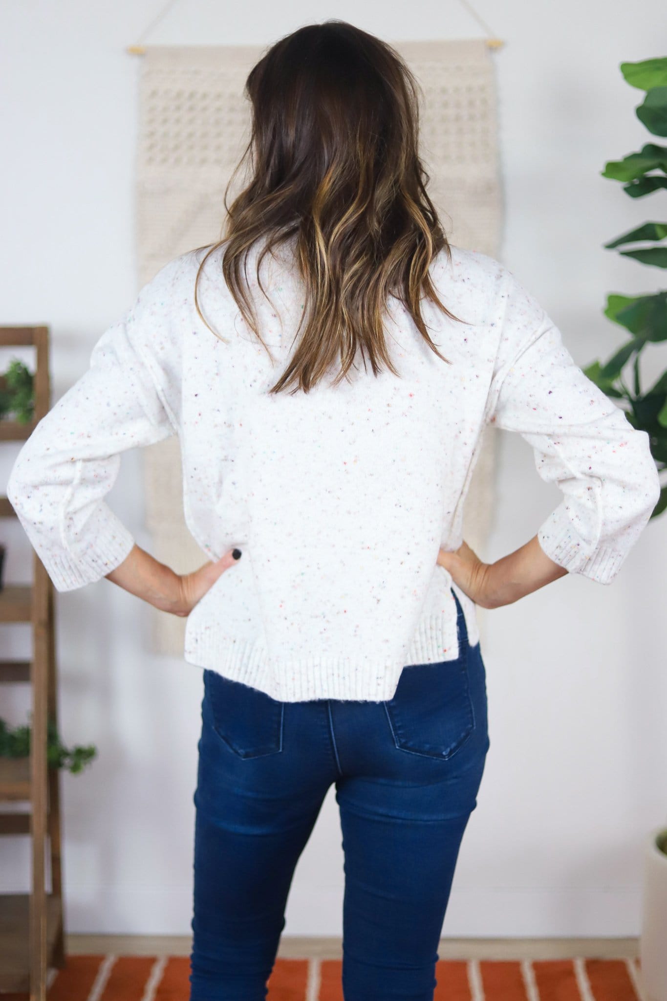 back of white warm sweater