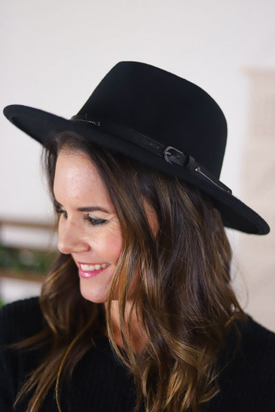 dark felted brimmed hat with buckle