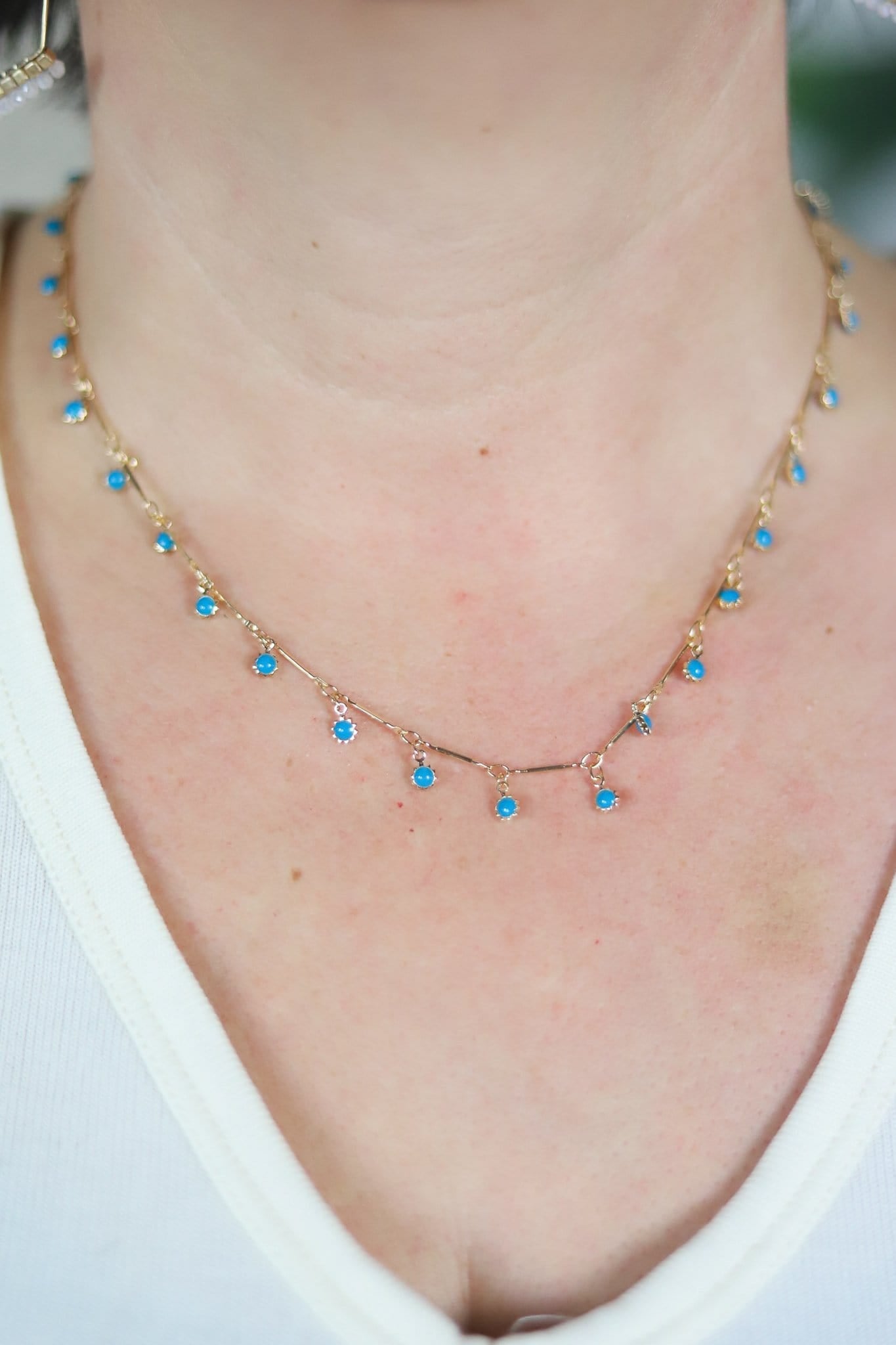 gold and turquoise stone necklace