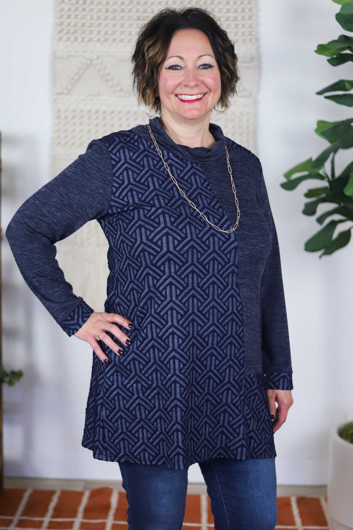 Dark blue cowl neck sweater with geometric pattern