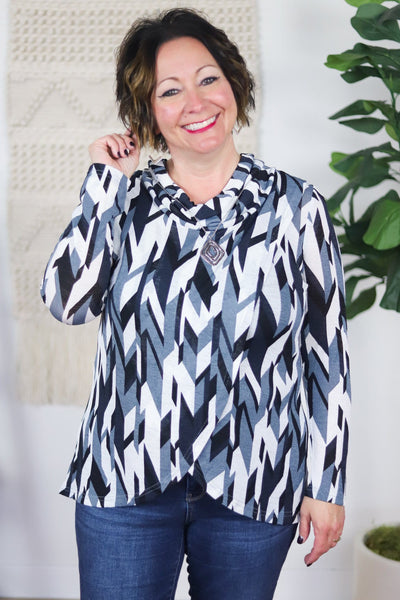 white dark and light blue cowl neck blouse