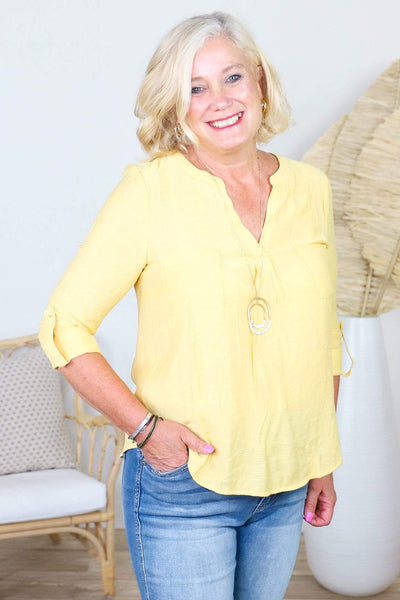 yellow 3/4 button blouse