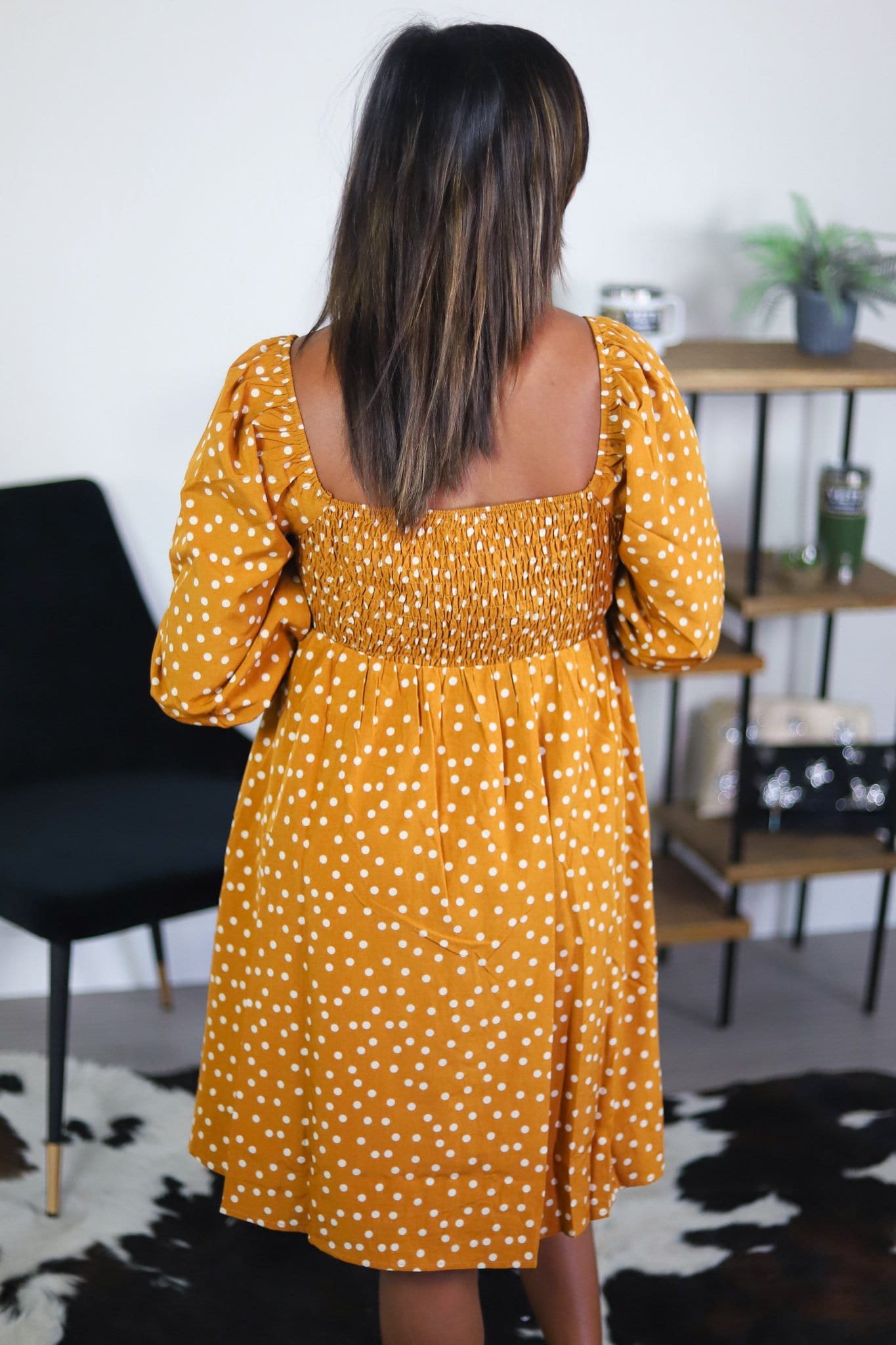 back of gold yellow dress with dots