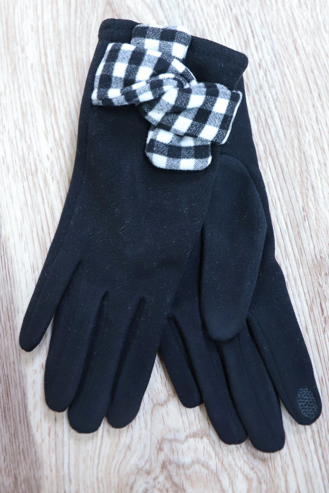 plain black glove with black and white wrist knot