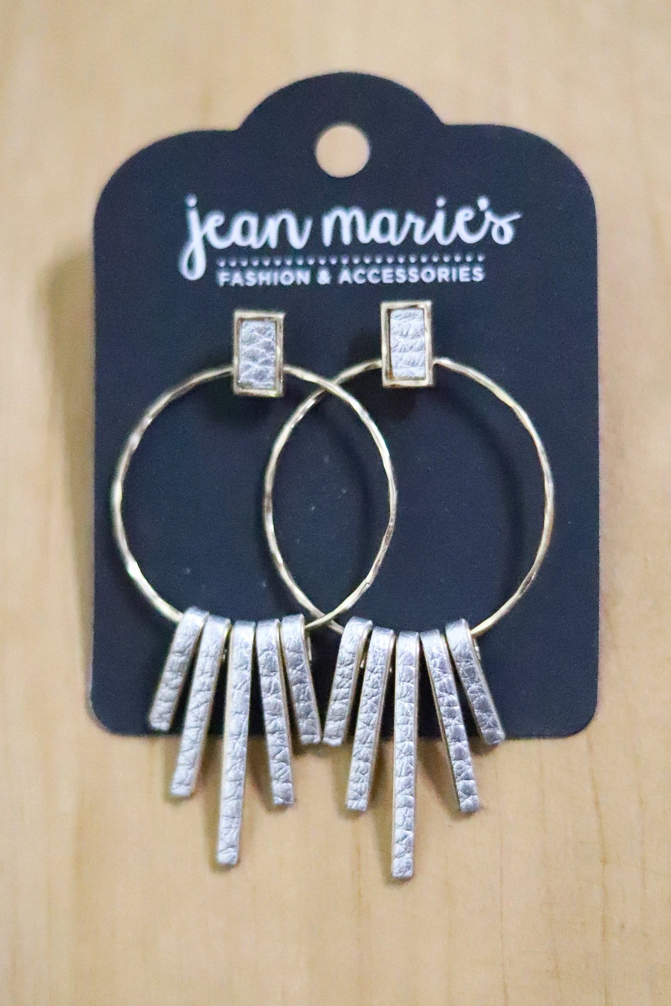 painted silver leather startburst earring 