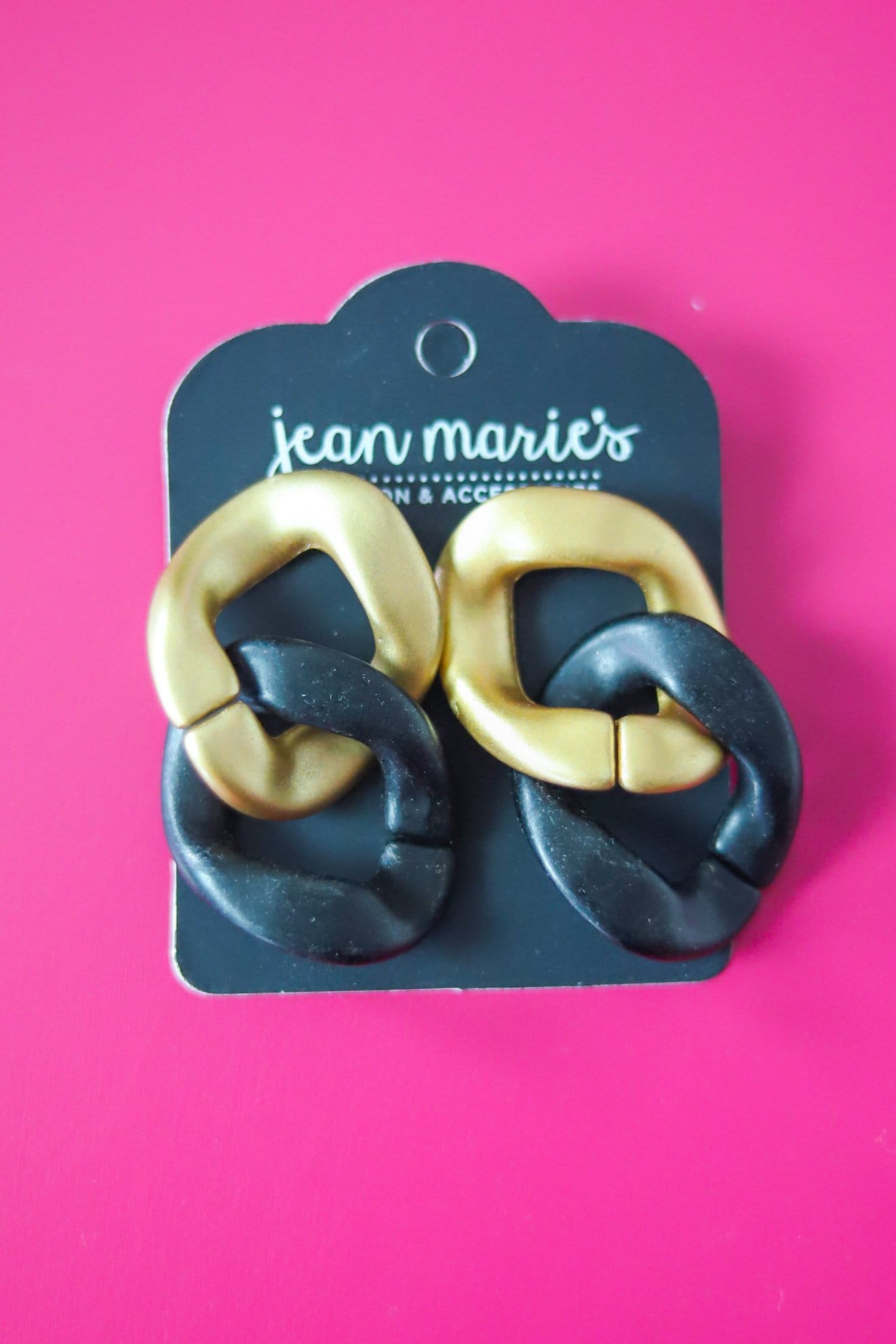 gold and black linked earrings 