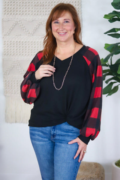red plaid sleeve top black body
