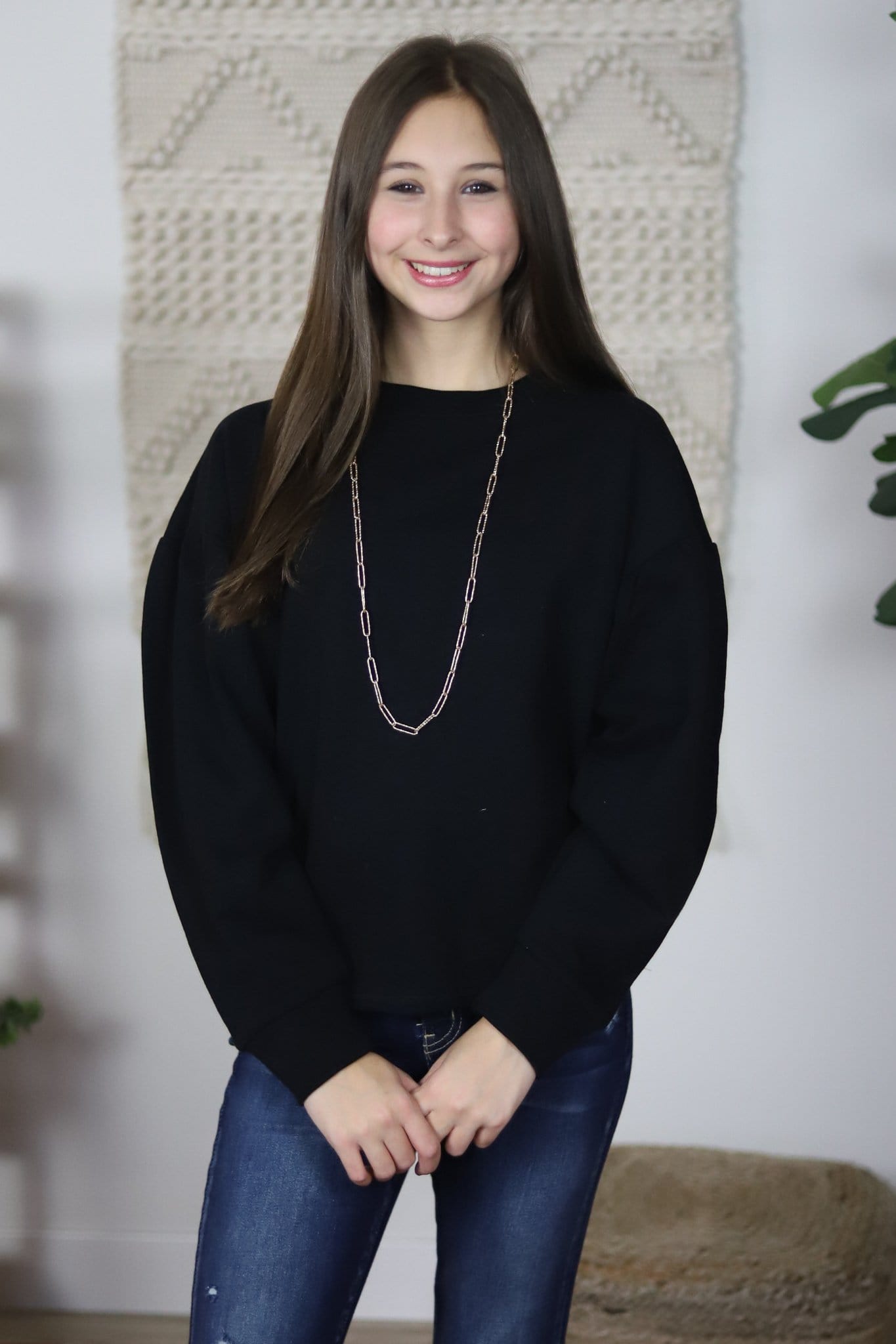 black sweatshirt puff sleeves back 