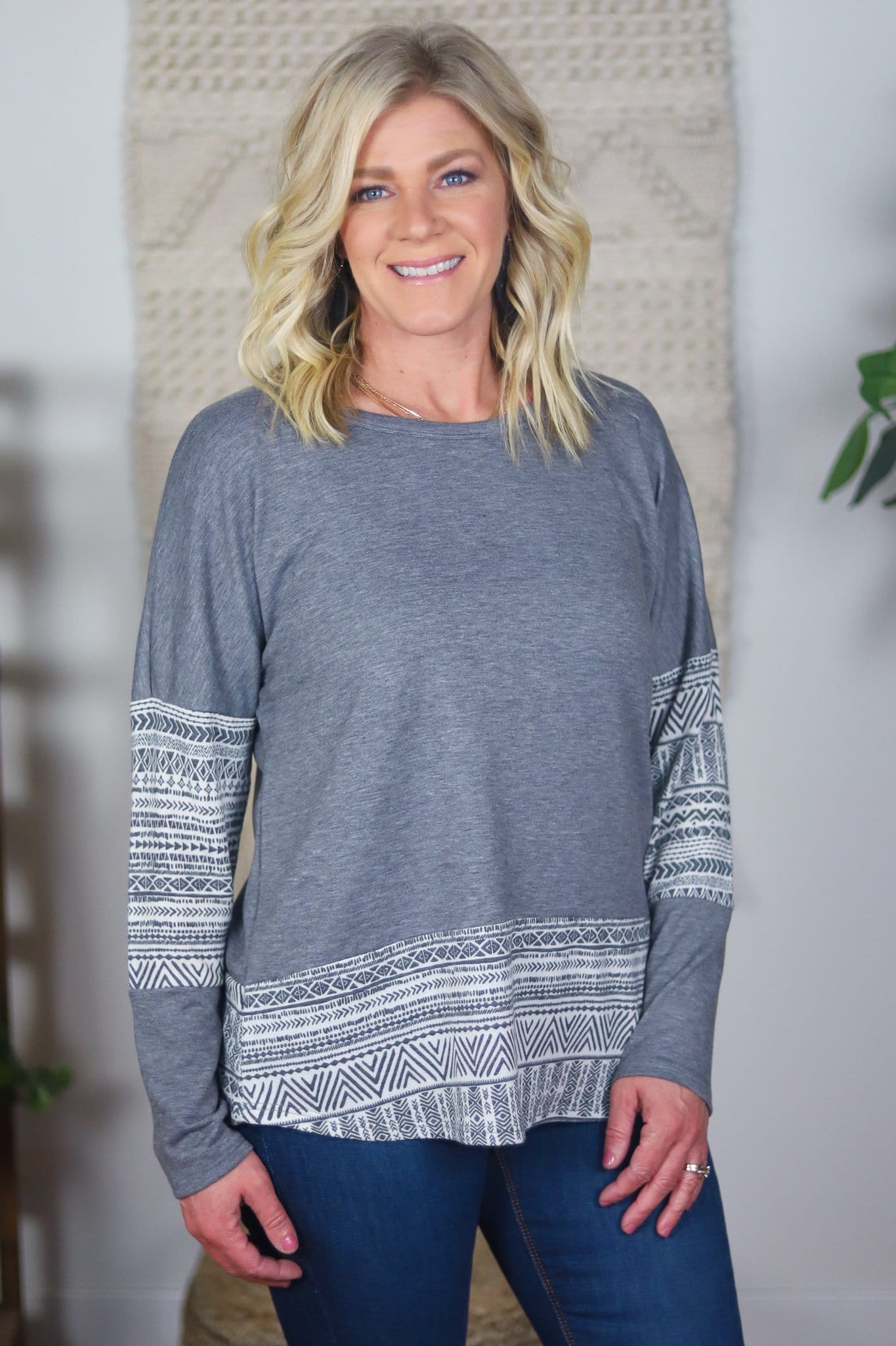 grey and white long top
