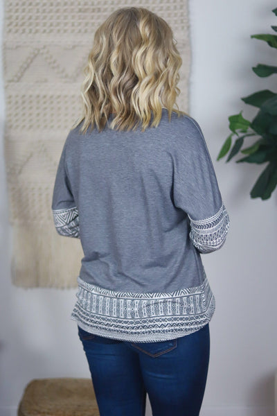 back of geometric grey white top
