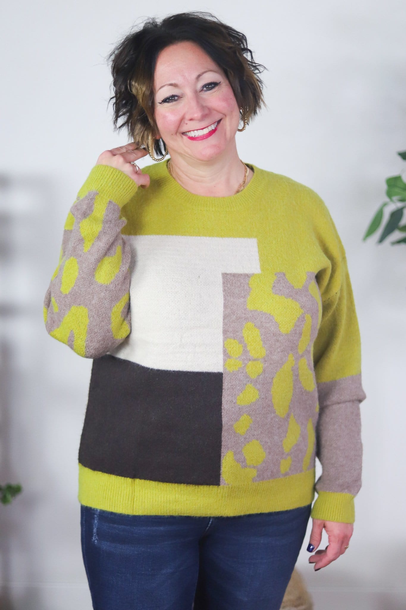 yellow white black animal print sweater 