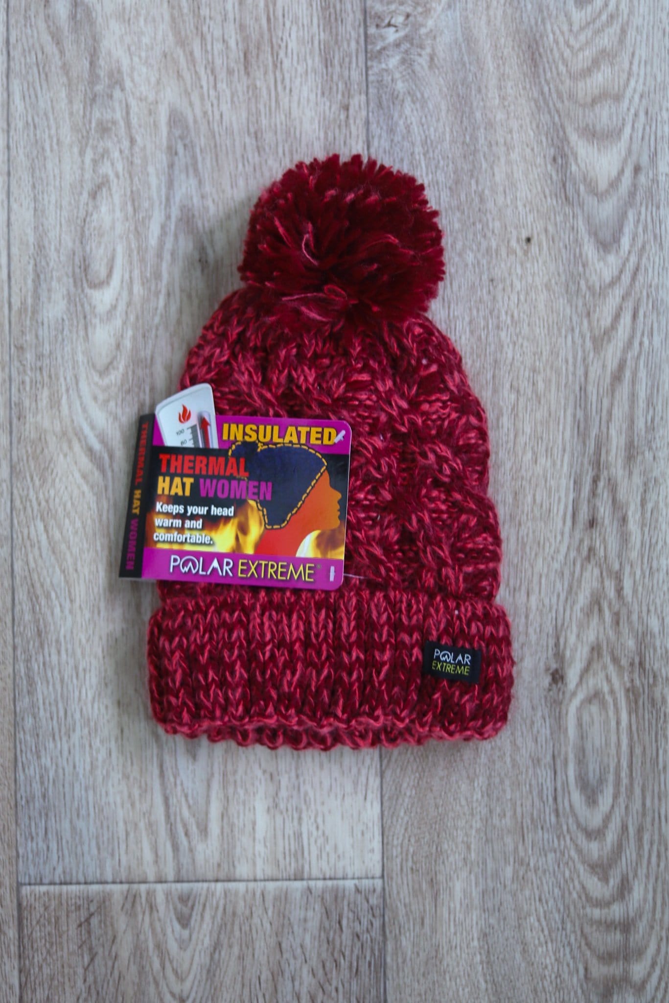 red fuzzy thermal pom hat 